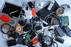 Pile of used Electronic Waste on white background, Reuse and Recycle concept, Top view 