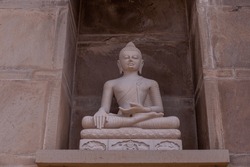 God buddha buddhishm arts. Statue of lord buddha made with indian stone.