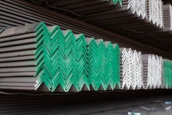 equal angles steel angle iron Metal profile angle in packs at the warehouse of metal products
The arrangement of hot-dip green steel angles on the rack in warehouse