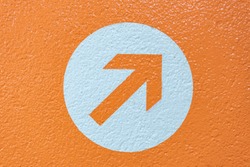 Vibrant orange arrow symbolizing a decision or choice to be made.