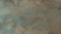 Canvas fabric surface, blue sky and white clouds design. Old distressed weaving colored cotton, white, beige and blue tone. Empty weathered sepia printing sheet. Abstract textile texture background