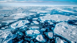 landscape of the North Pole where climate change has caused melting ice caps and reduced polar ice extent