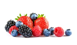 Big Pile of Fresh Berries on the White Background. Ripe Sweet Strawberry, Raspberry, Blueberry, Blackberry