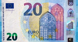 Fragment part of 20 euro banknote close up with small blue details