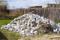 Crushed rock pile for construction, stone pile. large pile of concrete scraps. Selective focus