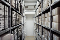 archive boxes shelf folders documents data