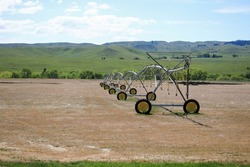 Wide view of center pivot irrigation system outside Sheridan, Wyoming.