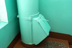 A garbage chute in the entrance of a Russian apartment building.