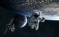 Astronaut, ISS in low Earth orbit. Moon. Solar system. Science fiction. Elements of this image furnished by NASA