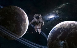 Astronaut in outer space. Planets on background of galaxy. Science fiction. Elements of this image furnished by NASA