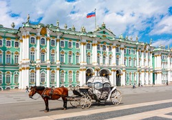 Horse carriage on Palace square and Hermitage museum at background, St. Petersburg, Russia