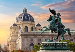 Statue of Archduke Charles on Heldenplatz square and Museum of Natural History dome at sunset, Vienna, Austria