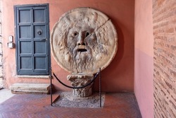 Mouth of Truth (Bocca della Verita) sculpture at Santa Maria in Cosmedin church, Rome, Italy