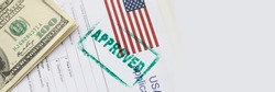 Stamp approved is on documents for obtaining American visa closeup