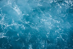 Blue ocean water texture background. Surface of the sea. 
