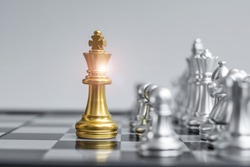 Gold Chess king figure on Chessboard against opponent or enemy. Strategy, Conflict, management, business planning, tactic, politic, communication and leader concept