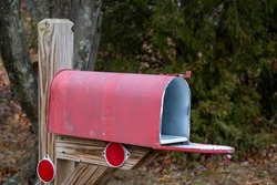 red painted Open suburb street  side mailbox 