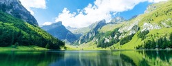 Lake in the Swiss Alps. Panoramic view of the nature and mountains of Switzerland.