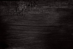BBQ background. Burnt wooden Board texture. Burned scratched hardwood surface. Smoking wood plank background. Dark Burned wooden texture empty horizontal surface, copy  space