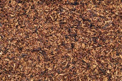 Dry tobacco leaves cut texture. High quality dry cut tobacco  big leaf, macro close up 