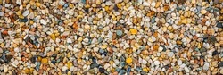Premium Quality Multicolor quartz aquarium substrate. Colorful decorative gravel background. Garden pond gravel backdrop. Terrarium natural Sand texture. Cacti Succulents sandy Soil Mix. Banner.