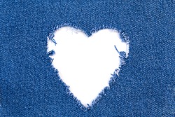 Jeans Heart Frame Hole. Destroyed torn denim blue jeans frayed flap patch fabric on white background