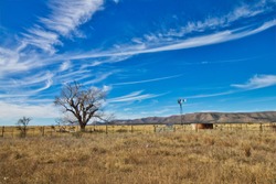 West Texas ranch land with windmill and corrals