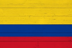 Flag of Colombia on wooden background