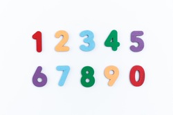 number on white background. Colorful letters on background closeup. Alphabet toy