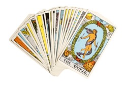 Deck of Tarot cards on white background ; THE WORLD..