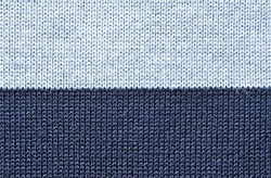 Navy blue and gray divided knit fabric texture as background