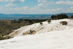 Panoramic view of travertines of Pamukkale (cotton castle) - unique nature wonder in Turkey