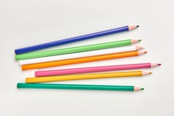 multi-colored pencils for drawing on white background