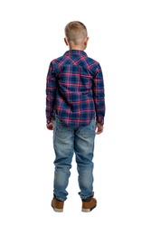 A 7-year-old boy in ldins and a blue plaid shirt is standing. Back view. Isolated on a whitw background. Vertical.