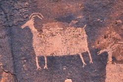 Petroglyphs Rock Paintings St George Utah on Land Hill from Ancestral Puebloan and Southern Paiute Native Americans thousands of years old on Sandstone. USA.