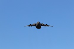 Airforce cargo plane in a clear sky