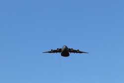 Airforce cargo plane in a clear sky