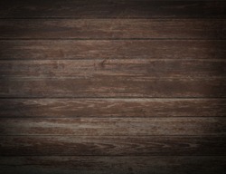Dark brown wood texture background coming from natural tree. Old wooden panels that are empty and beautiful patterns.