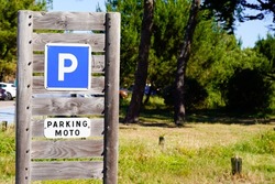Motorcycle Parking road Symbol Sign with text in french moto traduction in english motorbike
