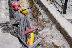cable underground during works electrical gas and telecommunications cables and water pipes on the street