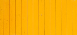 Wooden texture orange old wood background from planks natural yellow