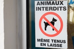 Prohibiting red signs animals prohibited even on a leash dog sign french text means animaux interdits même tenus en laisse on access store