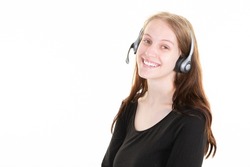 happy blonde woman over isolated white background working callcenter agency with headset phone