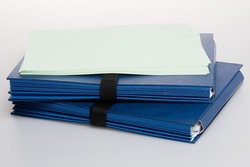 Folders full of business papers blue cardboard document folder business paperwork 