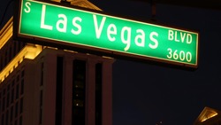 Fabulos Las Vegas, traffic sign glowing on The Strip in sin city of USA. Iconic signboard on the road to Fremont street in Nevada. Illuminated symbol of casino money playing and bets in gaming area.