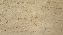 crack and surface texture of dry soil ground in full frame, abstract background, beauty in nature