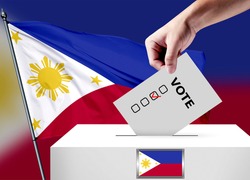 Elections in the Philippines. The hand that puts the game in the ballot box. Philippines flags in the background. Country flag election.