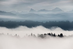 Foggy layered mountain landscape in Fort Langley, British Columbia, Canada