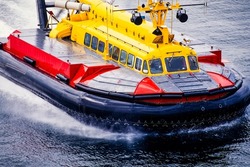 Aerial of a hovercraft operating on the British Columbia coastline.