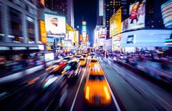 Time Square - New York in movement. Shot of cars in movement with motion blur.